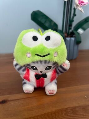 Cute Plush Cat in Green Frog Hat